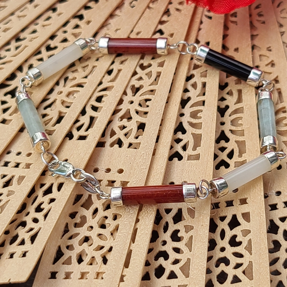 Unique Vintage Red, Black, White, and Green Bracelet